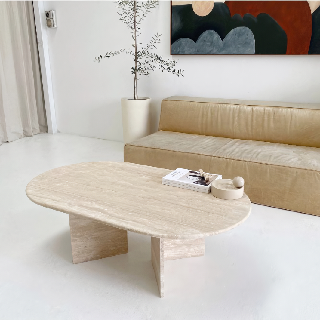 Mesa de centro de mármol rectángular con bordes ovalados