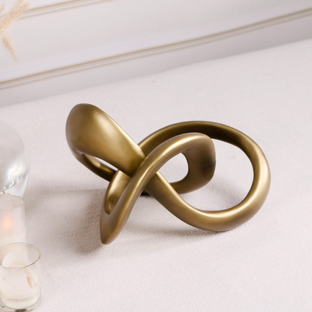 Nudo Decorativo en color oro viejo